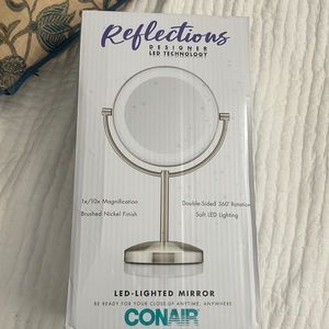 Unopened Reflections Design Led Technology mirror by Conair